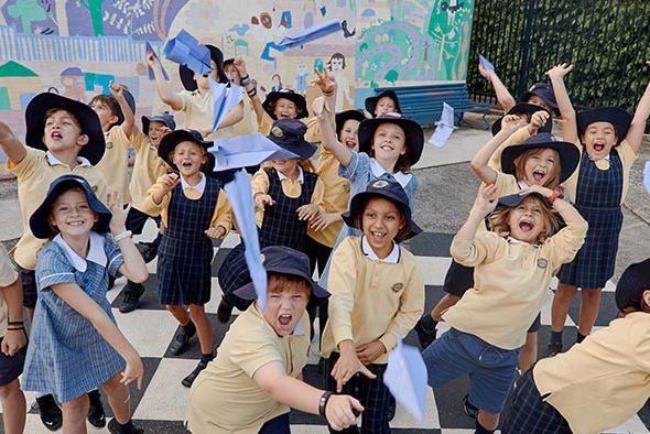 Students celebrate the end of the 2021 school year.