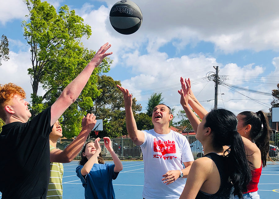 Placeholder image Group of kids playing basketball